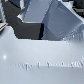 Building roof with protective covering