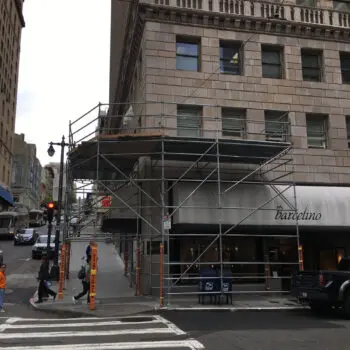 Building exterior with metal scaffolding