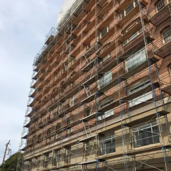 Building with scaffolding for construction