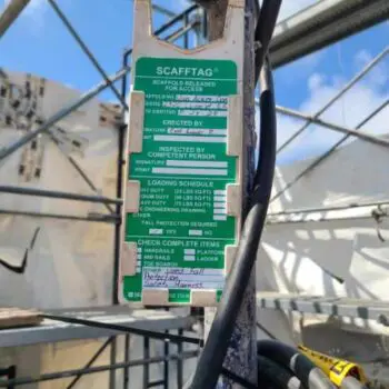 Scaffold inspection tag hanging outdoors